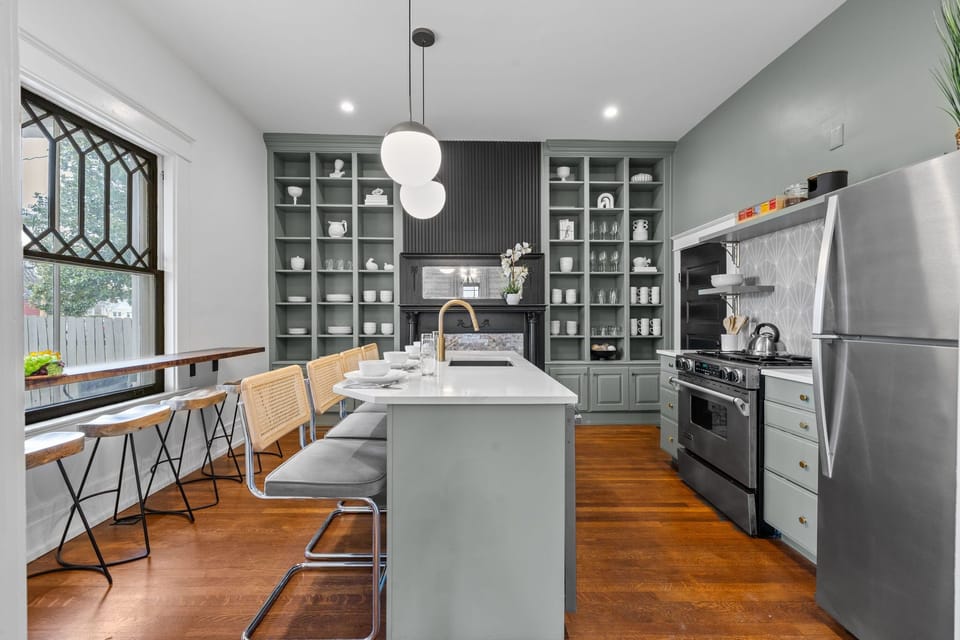 1st Floor: The kitchen on the first floor has stainless steel appliances.