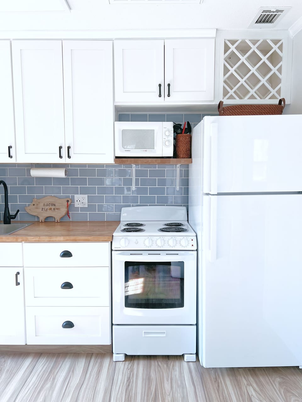 Stove, oven, microwave, full-size fridge. 