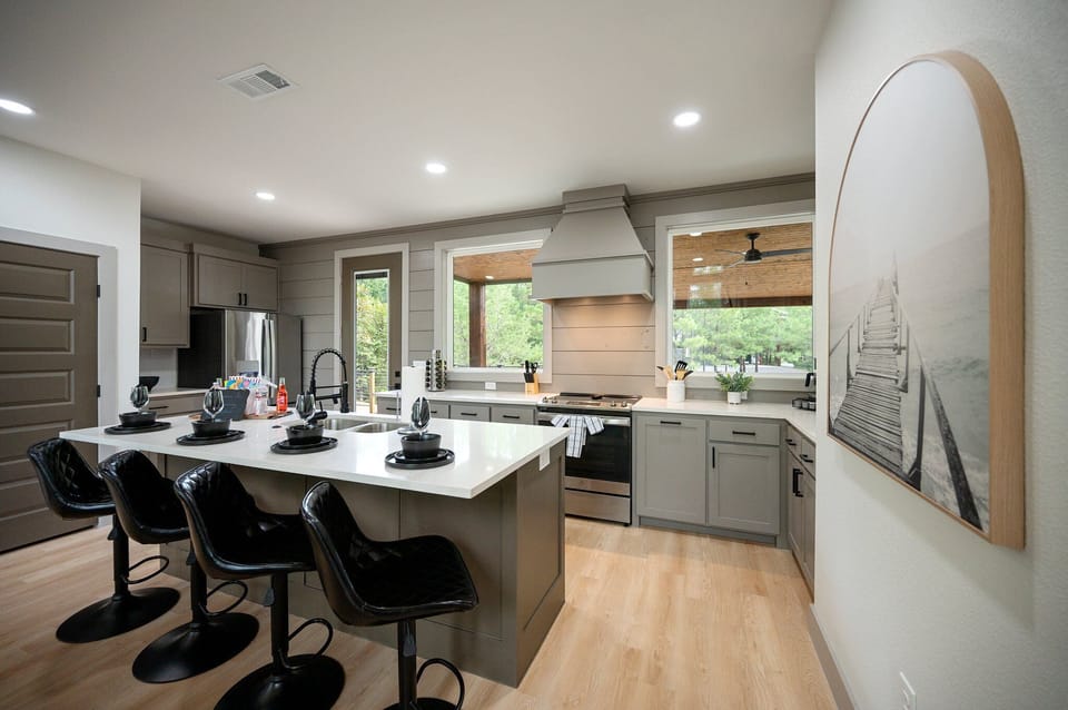 Stylish modern kitchen with a spacious island and cozy, inviting ambiance!