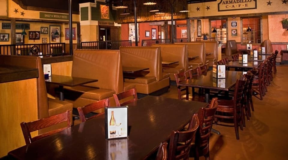 Gather for a warm, lively meal in rustic comfort.