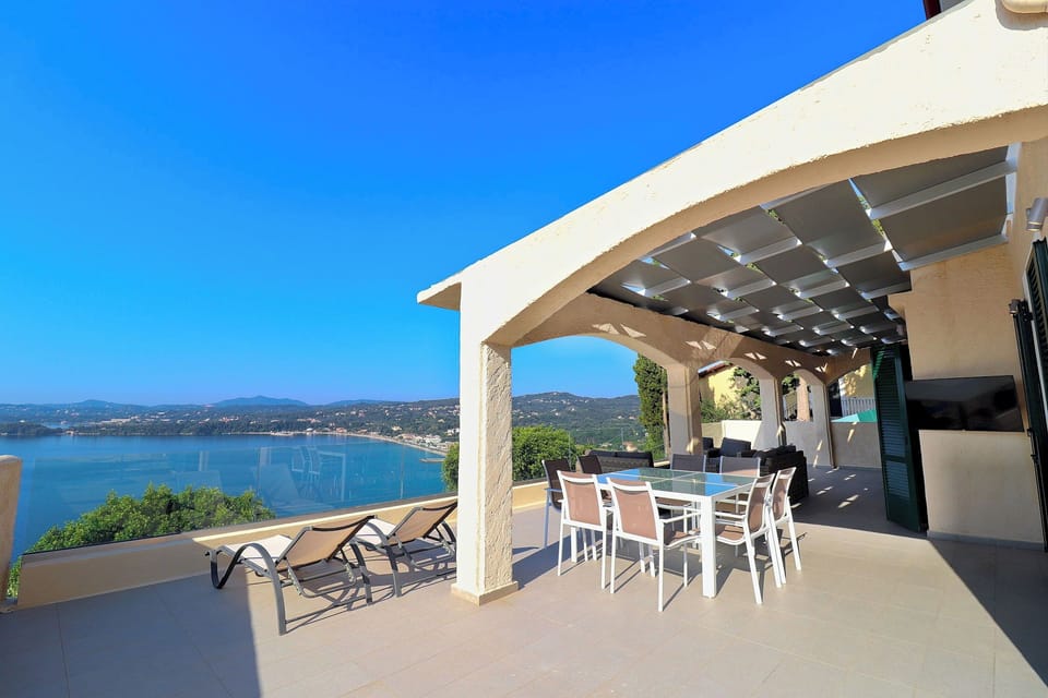 Plenty of outdoor space for your group in the upper level with large flat screen TV