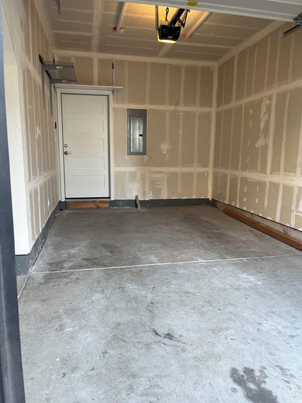 Single car garage with storage bay. Note: garage does not fit full size trucks