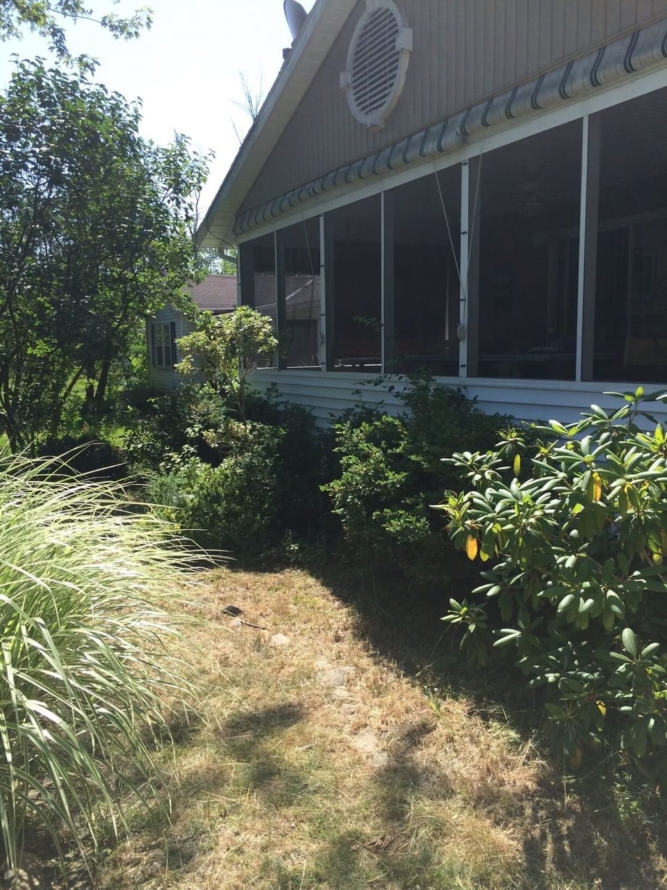 Large screened-in front porch