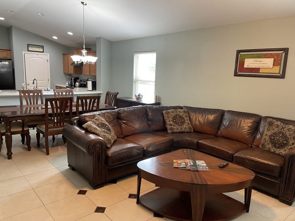 Livingroom with dining area in background 