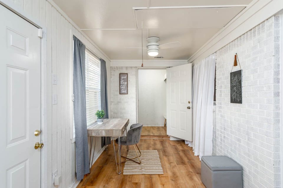Bedroom 4: Sunroom- twin size day bed and a desk working area.