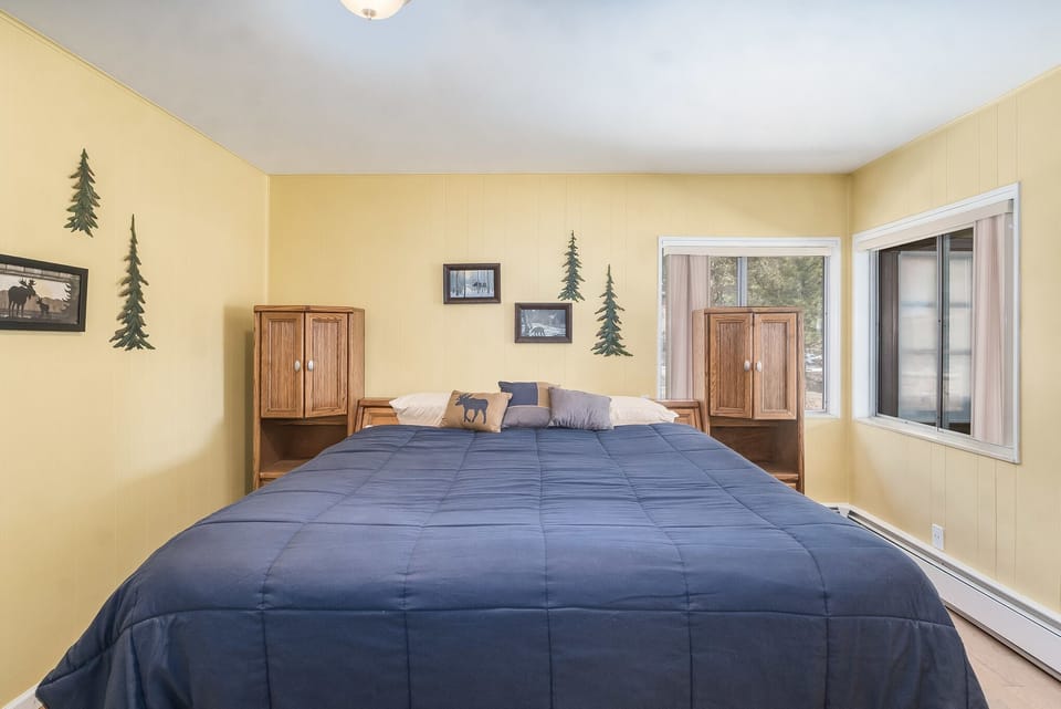 King-sized bed in downstairs Master bedroom
