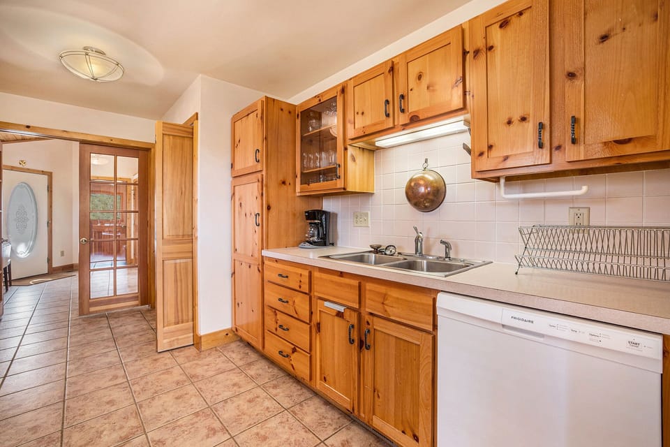 Kittery West Estes Park, Kitchen with dishwasher, double sink, and lots of counter space.