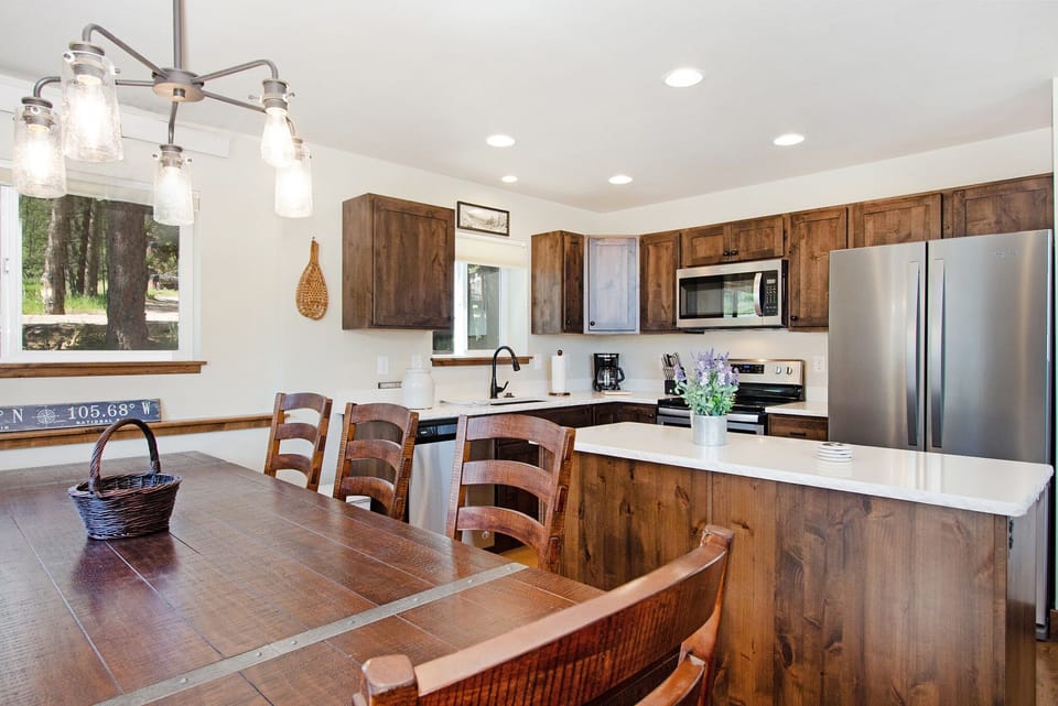 Dining table adjacent to the kitchen.