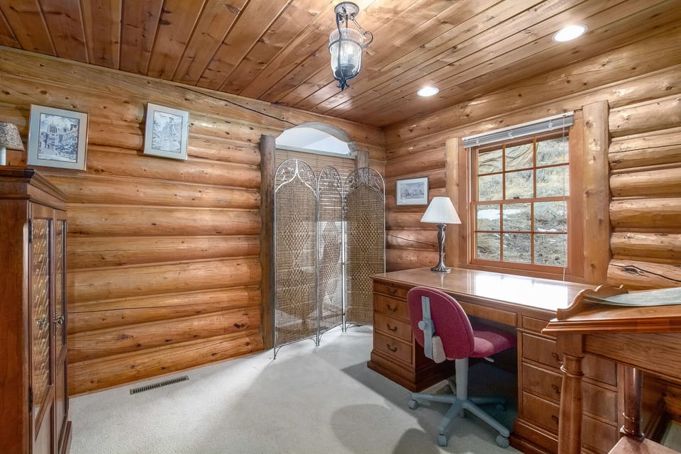 Main level den/study located off Roosevelt Room.