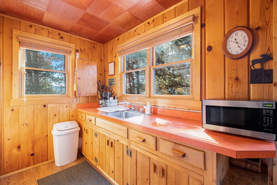 Chasm Cabin Estes Park, Kitchen has a microwave and oven.