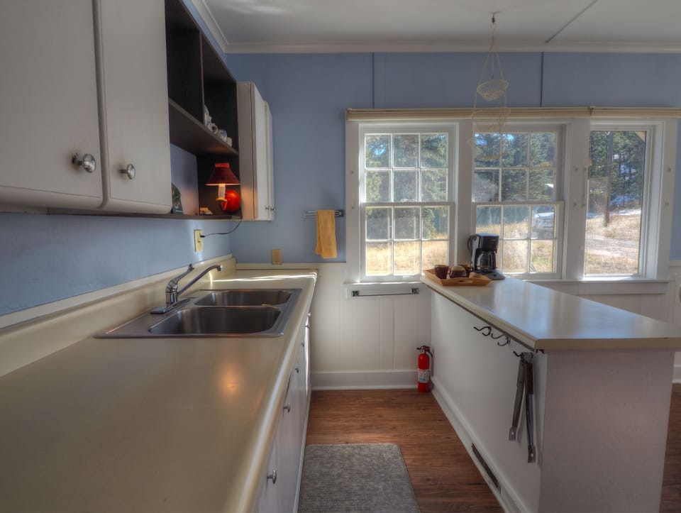 Another view of the sun-filled kitchen and its ample counterspace.