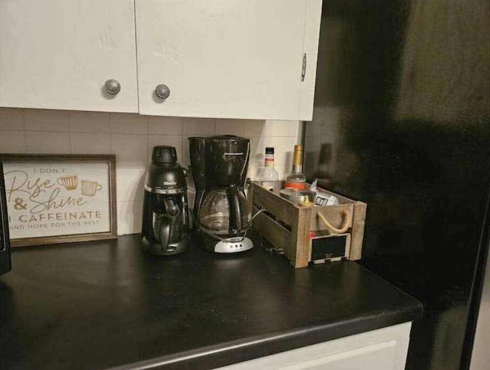 Espresso machine and drip coffee maker (coffee not provided).