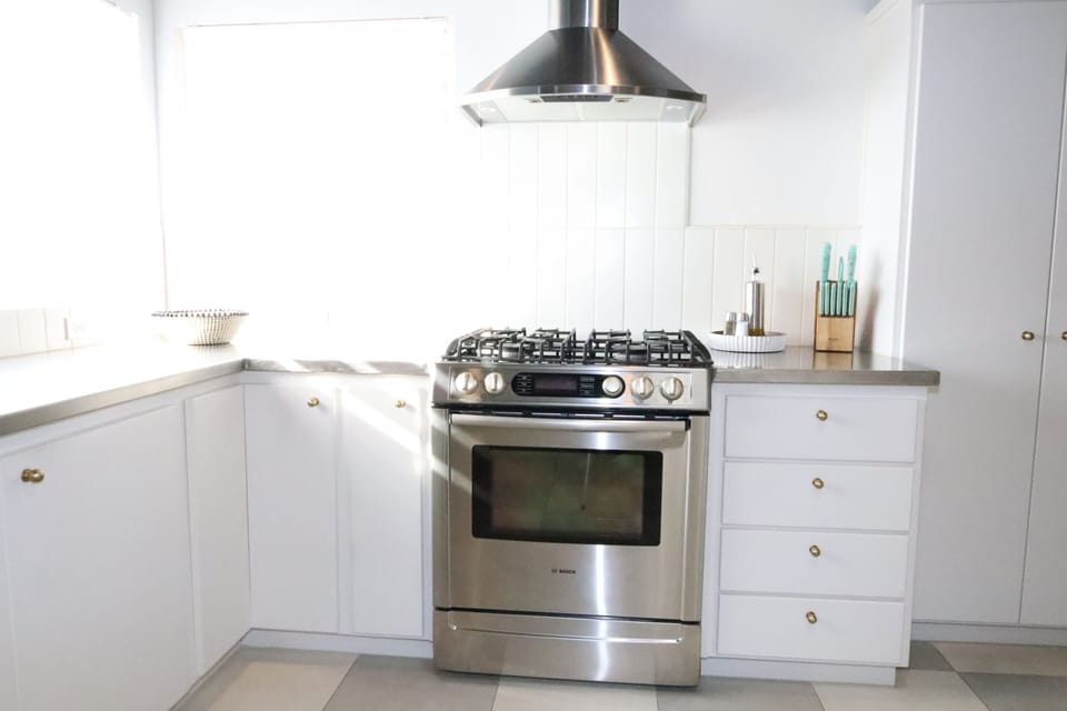 Range with gas stovetop and electric oven