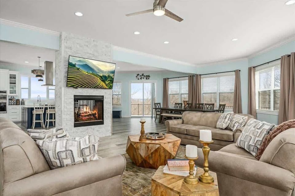 The open floor plan is ideal for large groups and families, providing abundant seating and space for everyone to come together and relax.