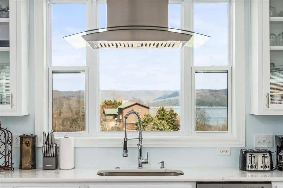Cleaning up is a breeze with the spacious stainless sink and new dishwasher.