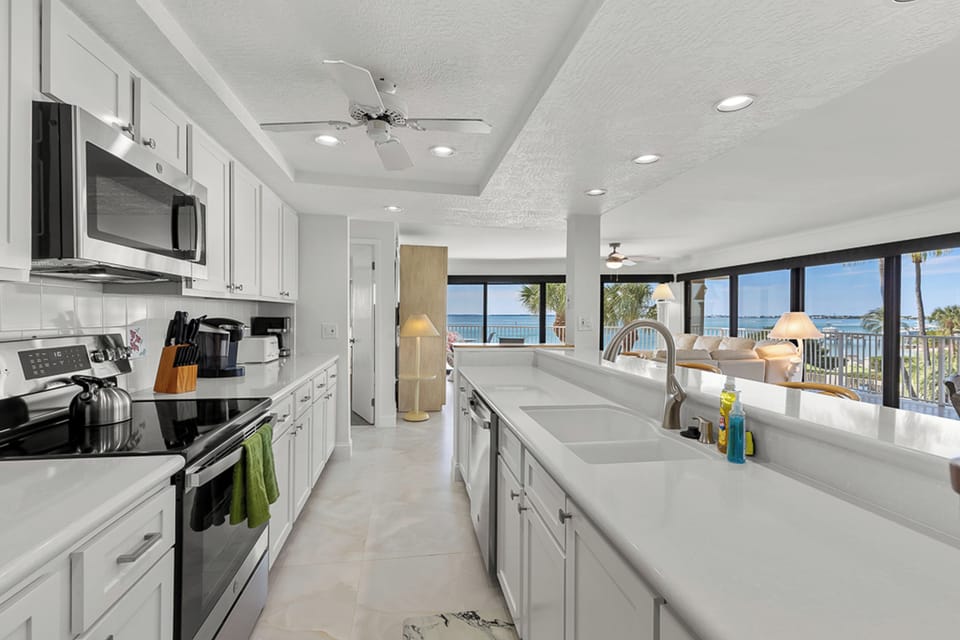 Clean kitchen with new cabinet fronts and appliances