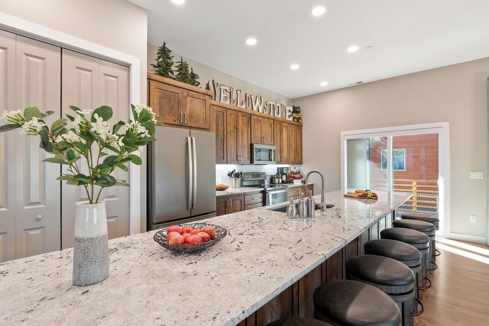 Picture yourself at the sprawling 15-foot island, enjoying a casual breakfast before embarking on your Yellowstone adventure or gathering with friends to plan the day's activities.
