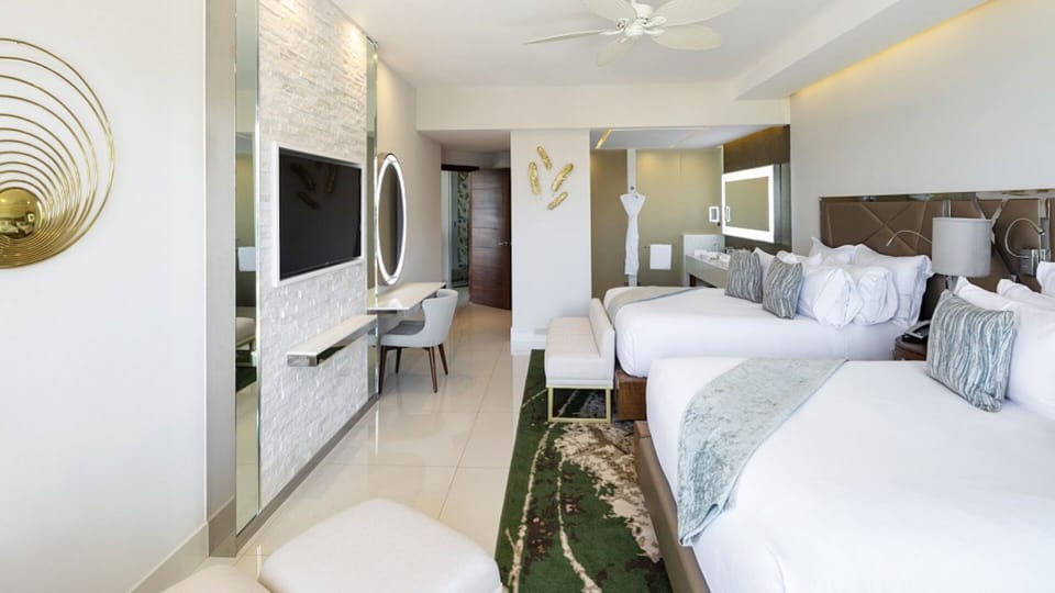 49-inch flat screen TV in the bedrooms