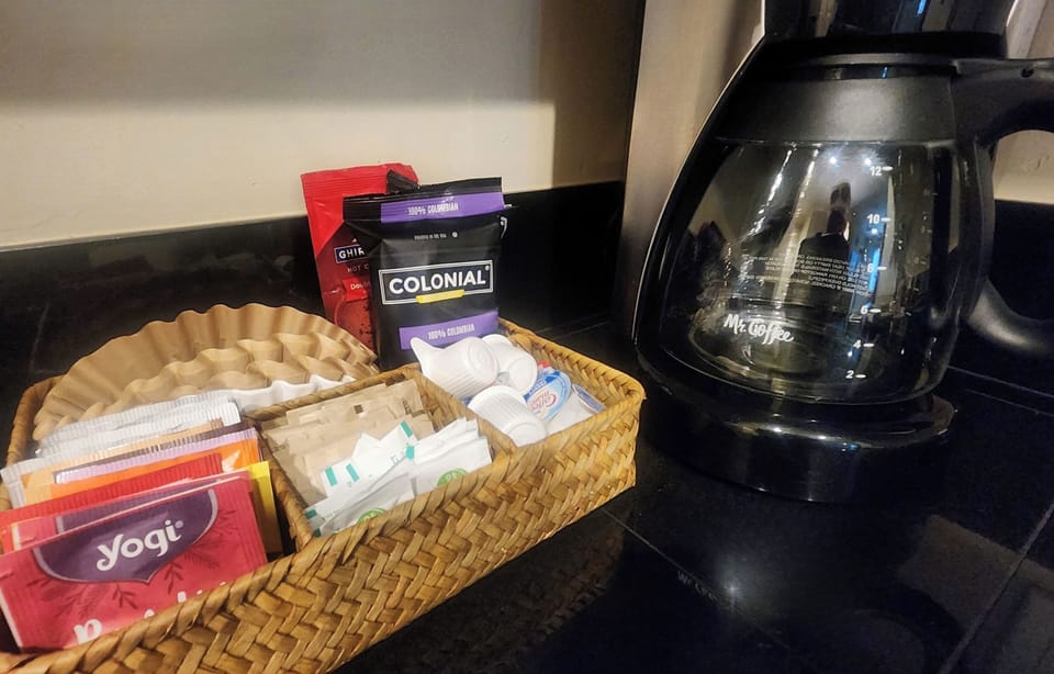 Stocked coffee and tea station with enough morning Joe to get you started!