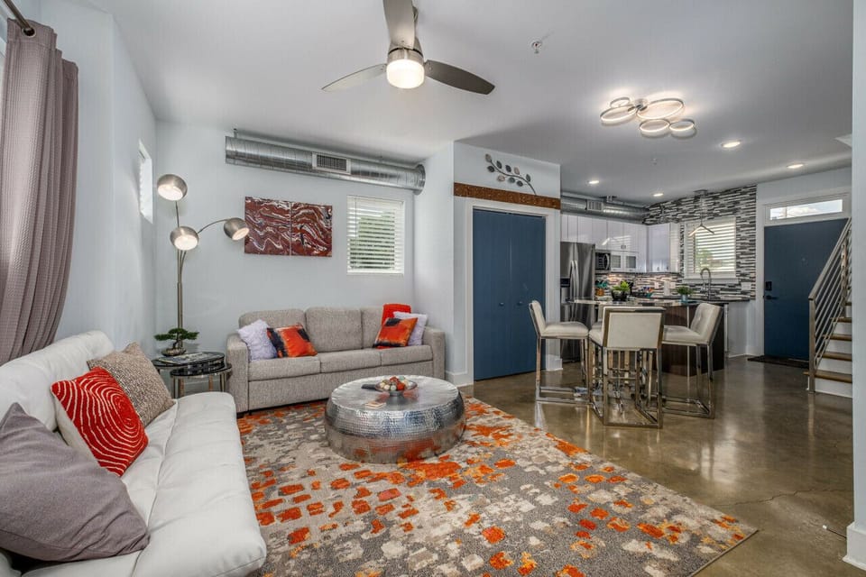 Living Room w/ Sofa Bed, Futon, & Smart TV