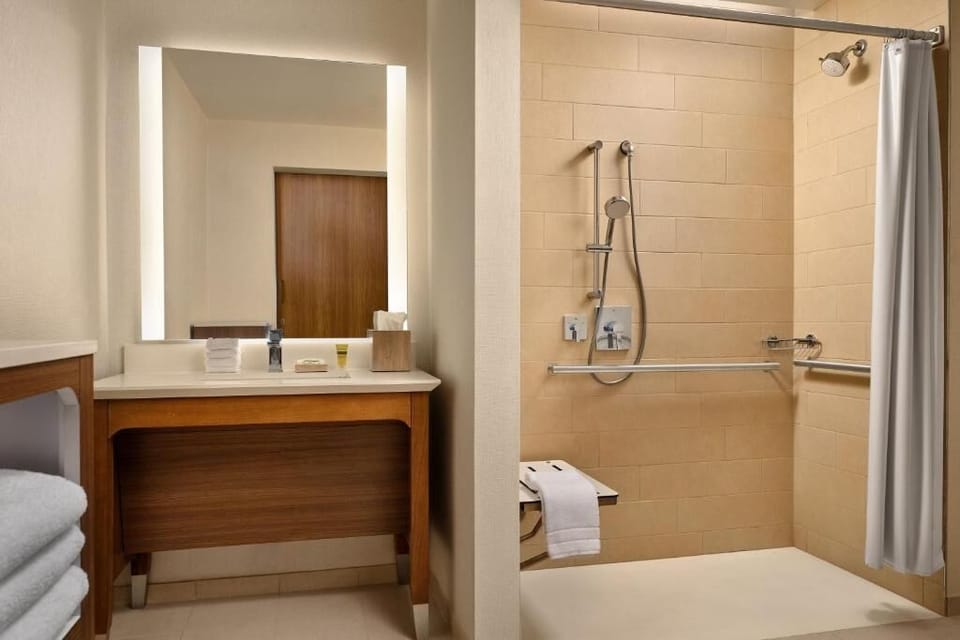 Clean up easily with an accessible shower and roomy counter space.