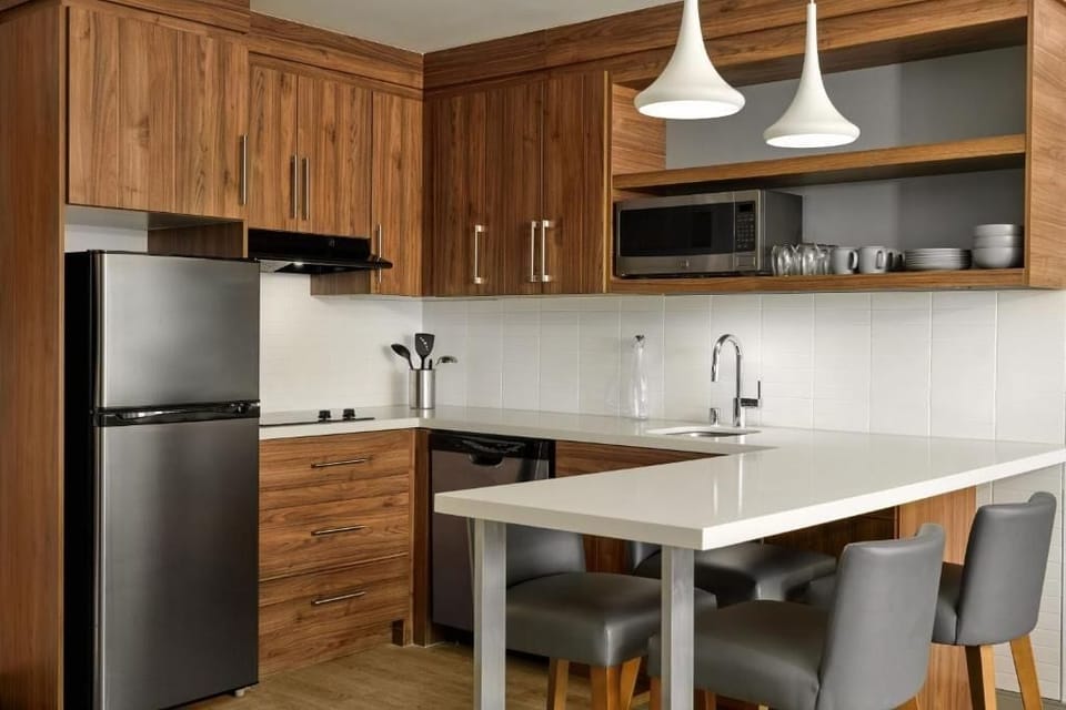 Cook and snack anytime in the sleek, well-equipped kitchenette.