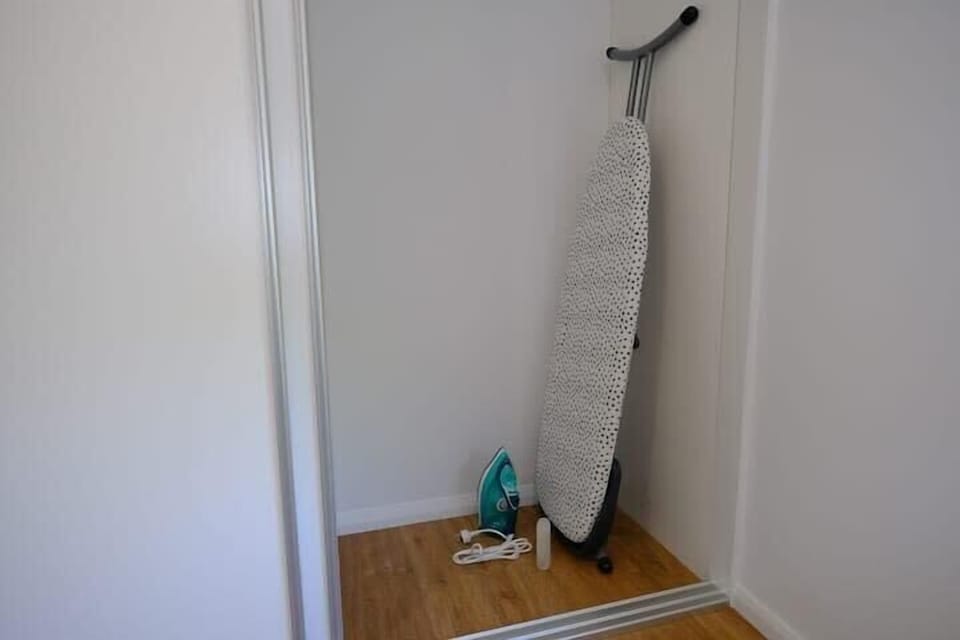 Ironing board and iron supplied