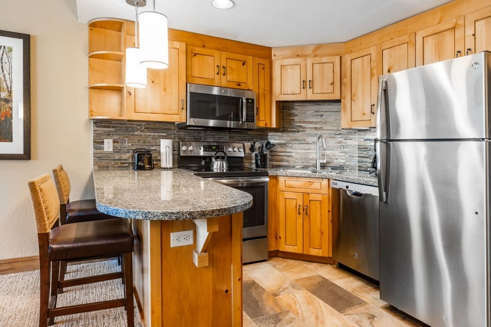 Full sized oven, stove, and microwave.