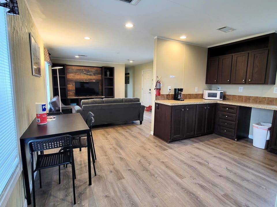 The kitchen has a small dining area as well.