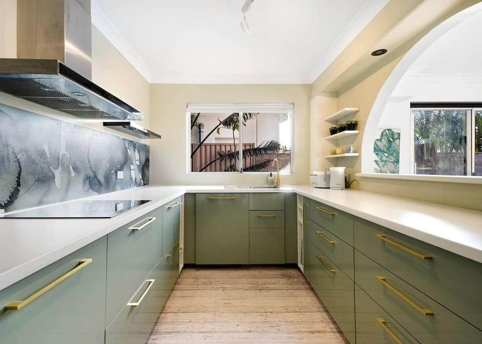 The generous, contemporary kitchen has all you need to cook up a feast, plus a dishwasher for easy clean-up. 
