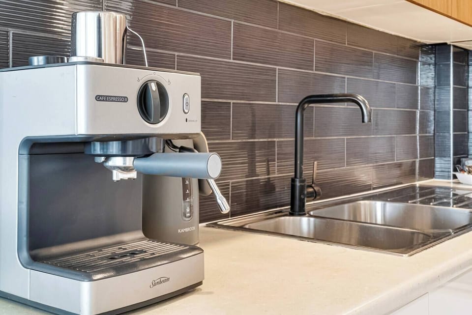 An espresso machine makes it easy to get your early morning caffeine fix.