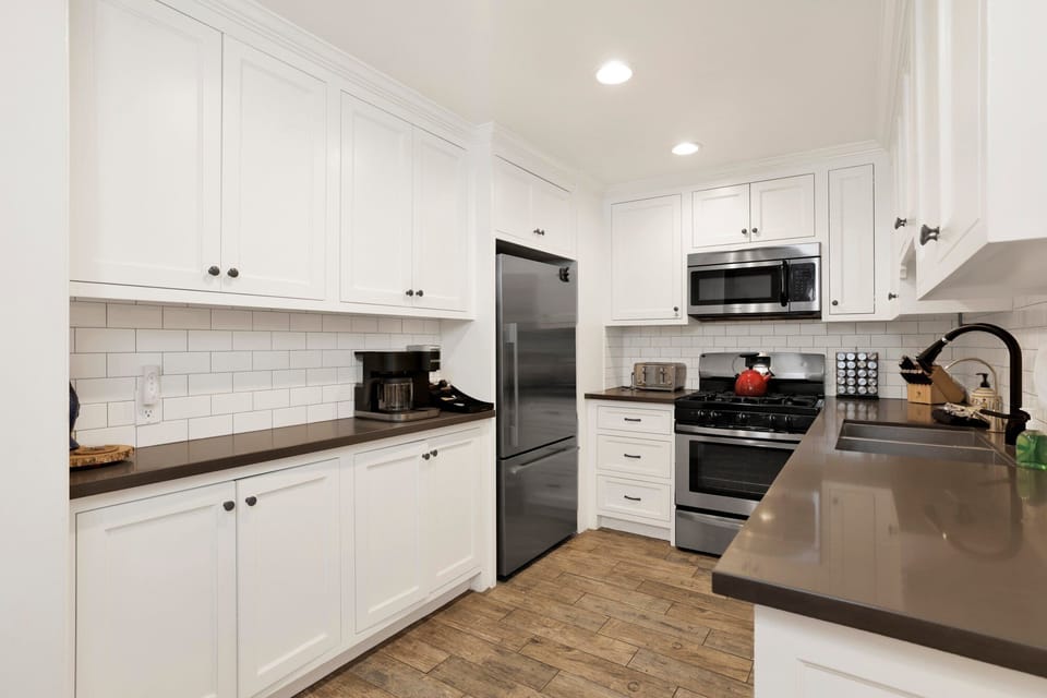 A well‑organized kitchen with modern essentials, generous counter space, and everything you need to prepare meals comfortably during your stay.