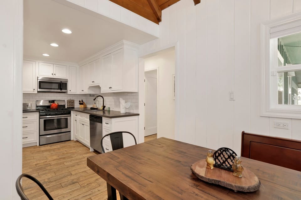 A bright, inviting dining area with comfortable seating—perfect for enjoying home‑cooked meals, morning coffee, or gathering with family and friends.