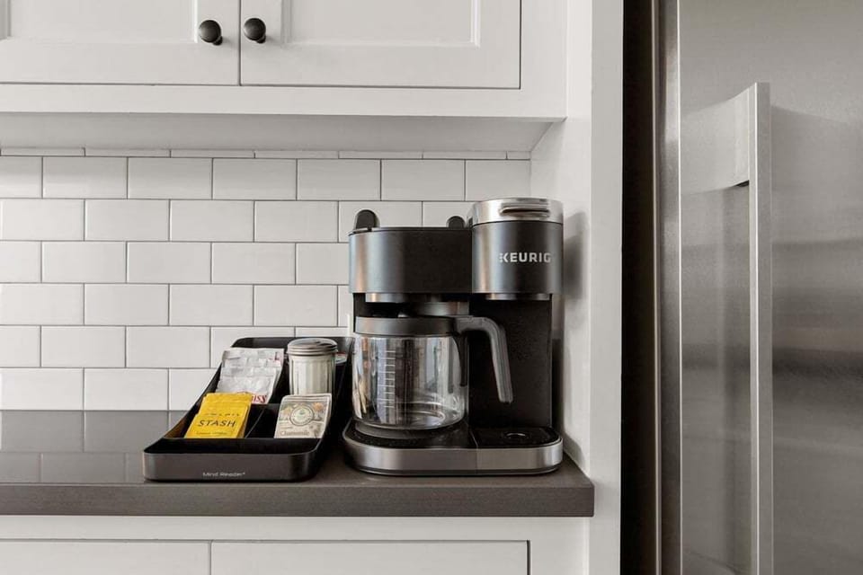 A charming coffee nook stocked with essentials—perfect for brewing your morning cup, unwinding in the afternoon, or enjoying a quiet moment during your stay.
