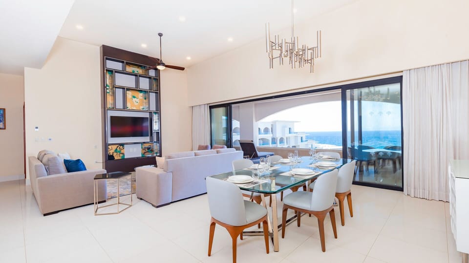 Dining and living area with ocean view