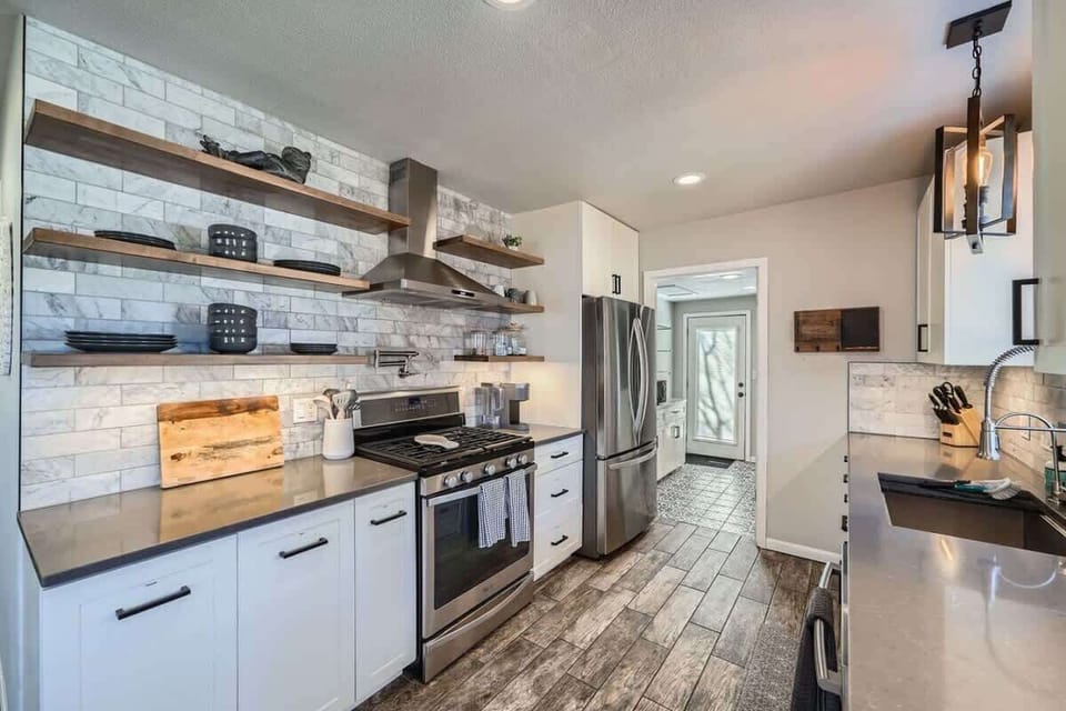 Functional and beautiful, this kitchen comes fully equipped with cookware, utensils, and small appliances.