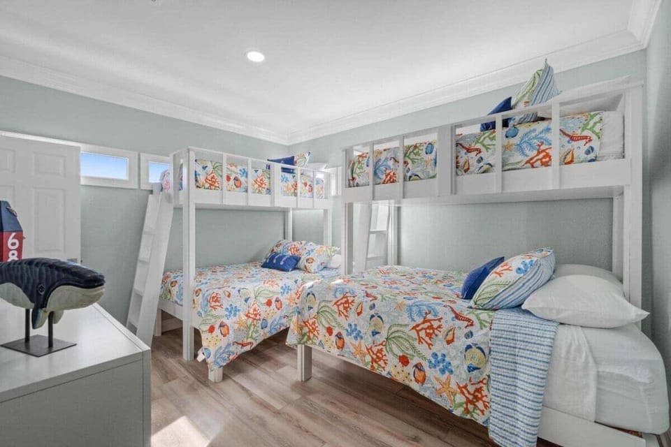 Two sets of bunk beds twin over full