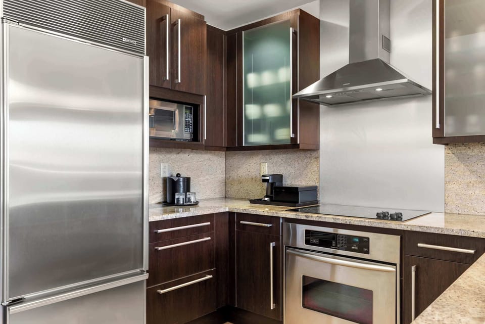 Full kitchen with stainless steel appliances