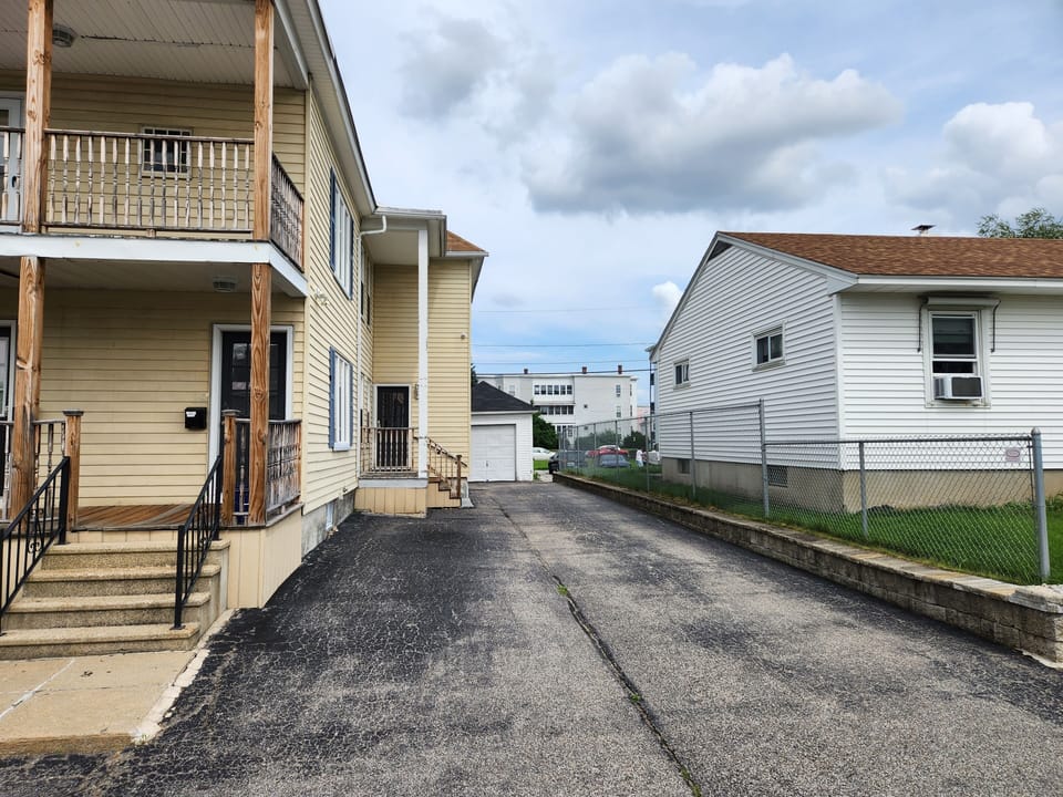 Driveway. Park on Left side.