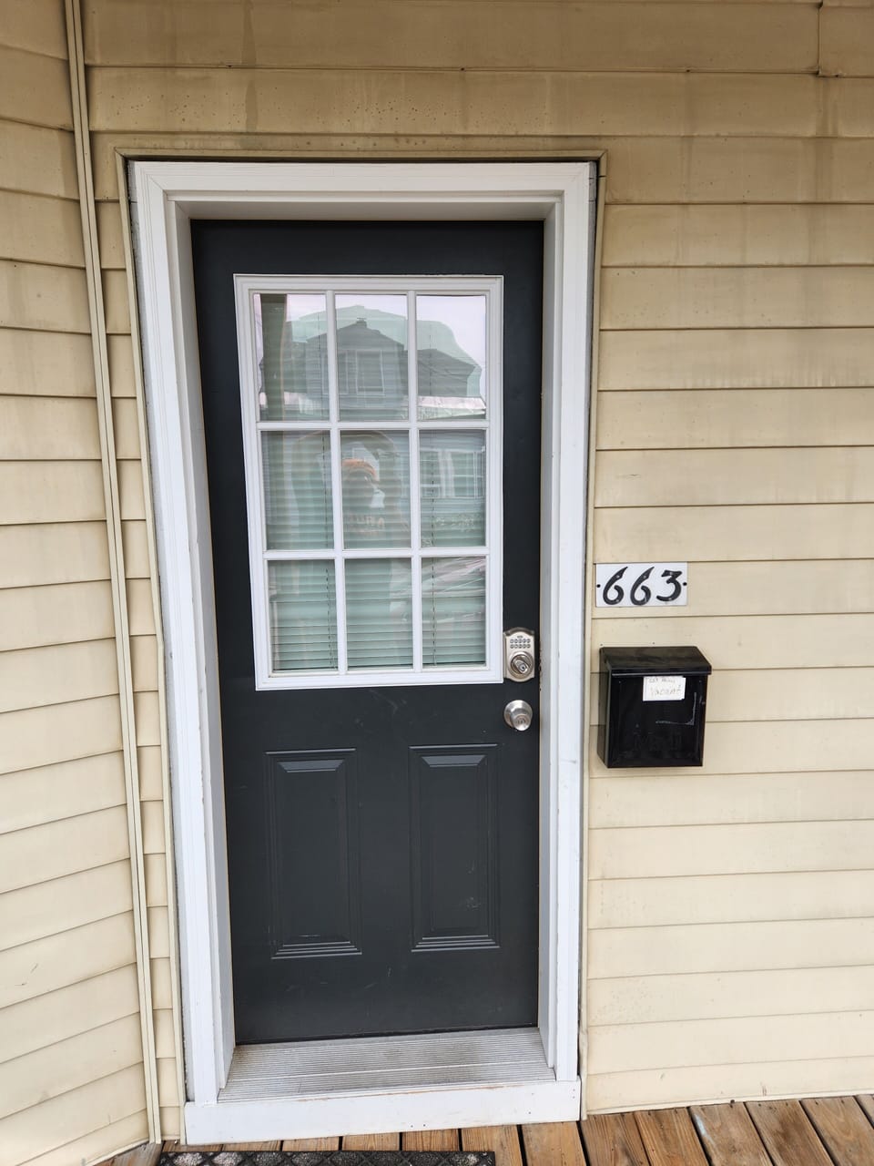 Unit Entry Door. Front Porch.