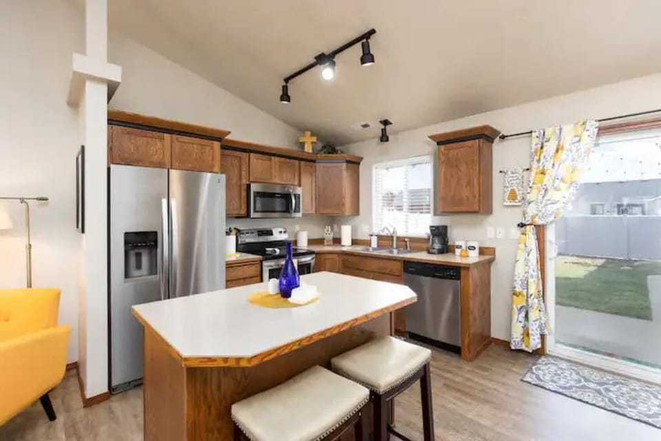 Fully stocked kitchen in open concept.