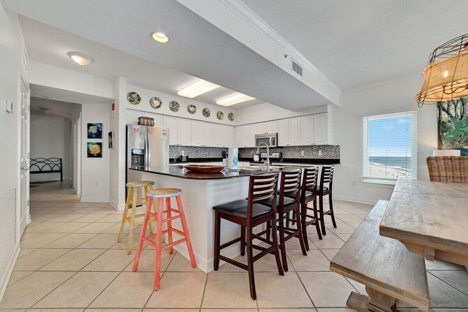 Kitchen with plenty of additional bar seating