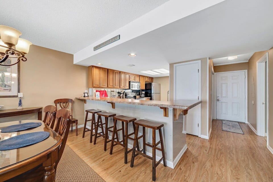 Breakfast bar and kitchen and entry
