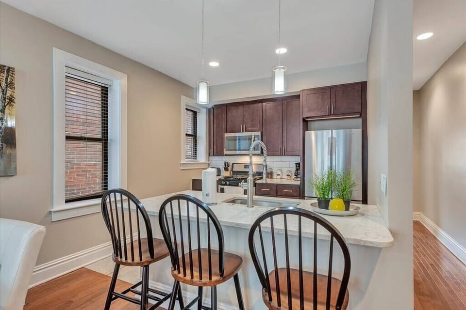 Living Room / Dining Room combo with Fully stocked kitchen 