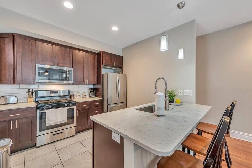 Living Room / Dining Room combo with Fully stocked kitchen 