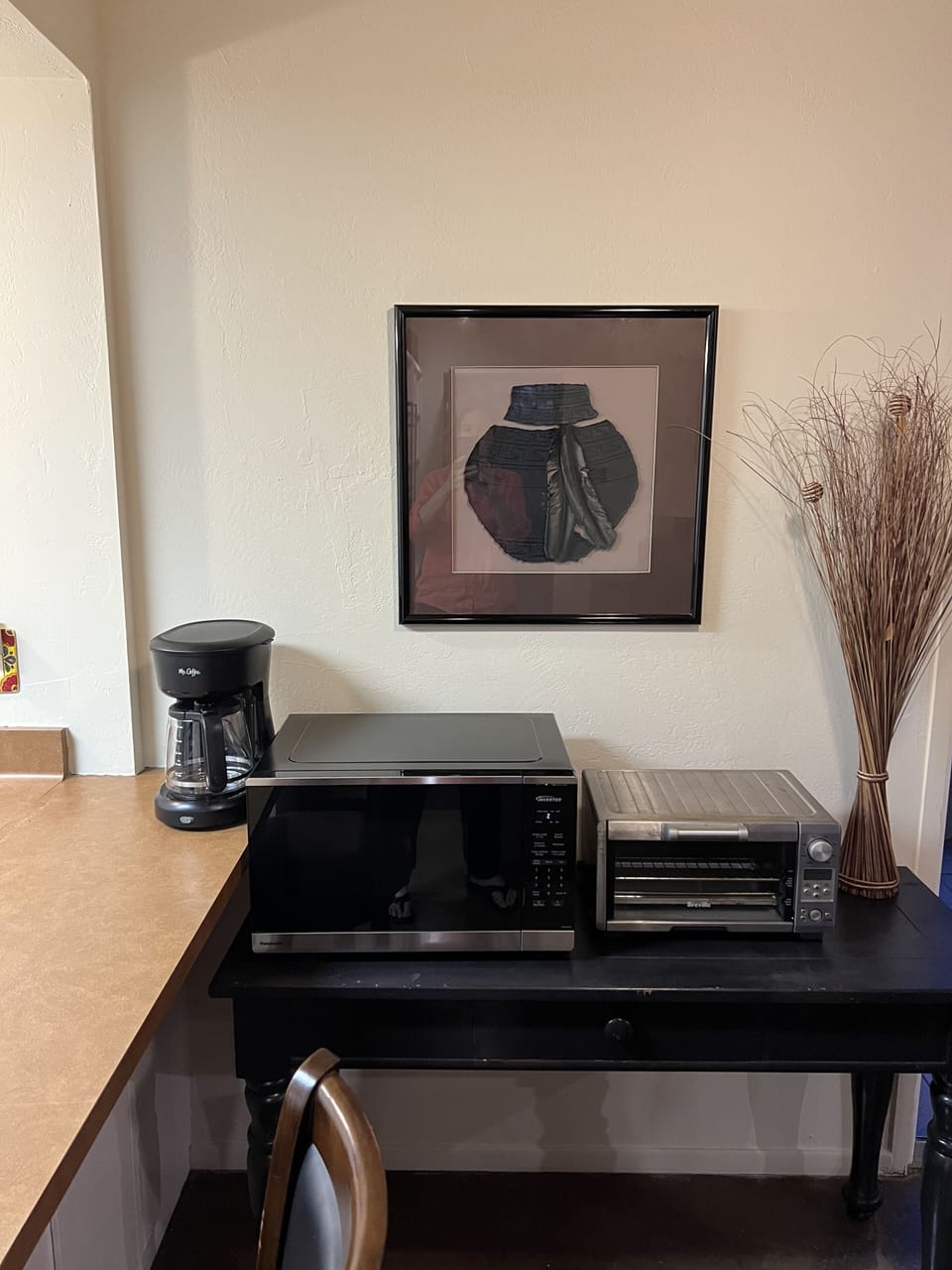 Brand new microwave, Breville toaster oven, and drip coffee maker.