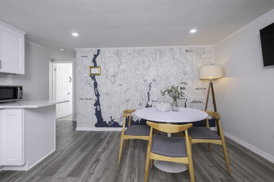 Enjoy your morning brew with a view. This compact bistro area maximizes space without sacrificing style, offering a cozy corner for every meal.