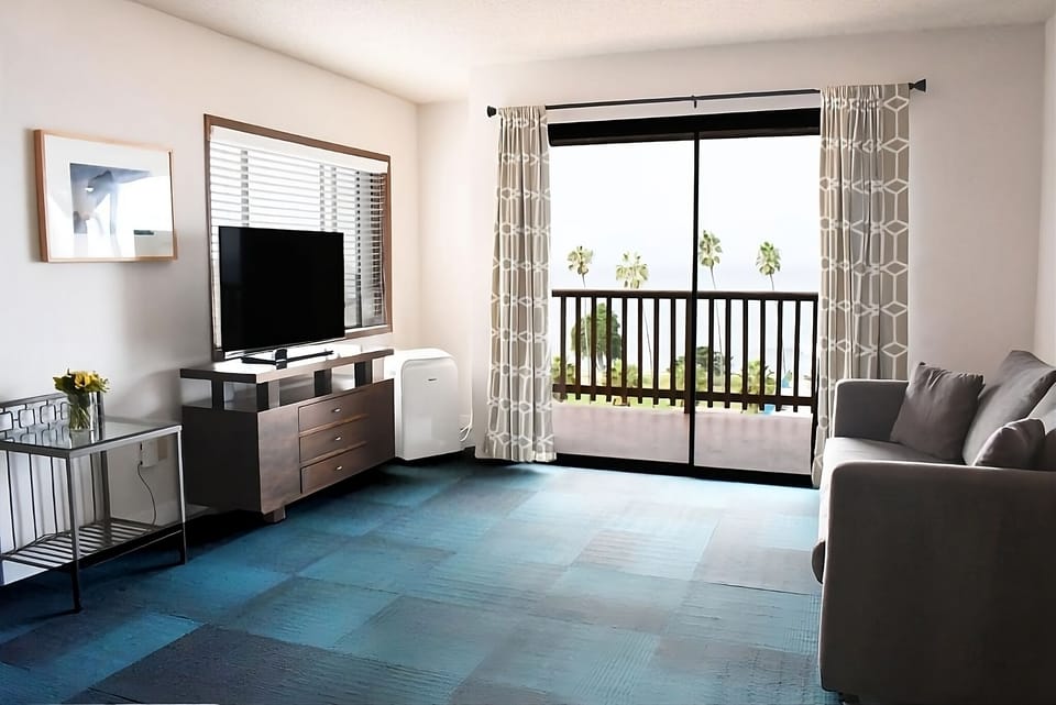 Living Area. Exact unit will be assigned upon arrival. Views, colors, and decor may vary