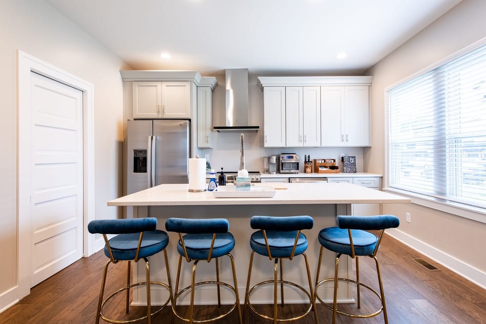 Dining area adjacent to the kitchen, perfectly set for memorable meals and engaging conversations.