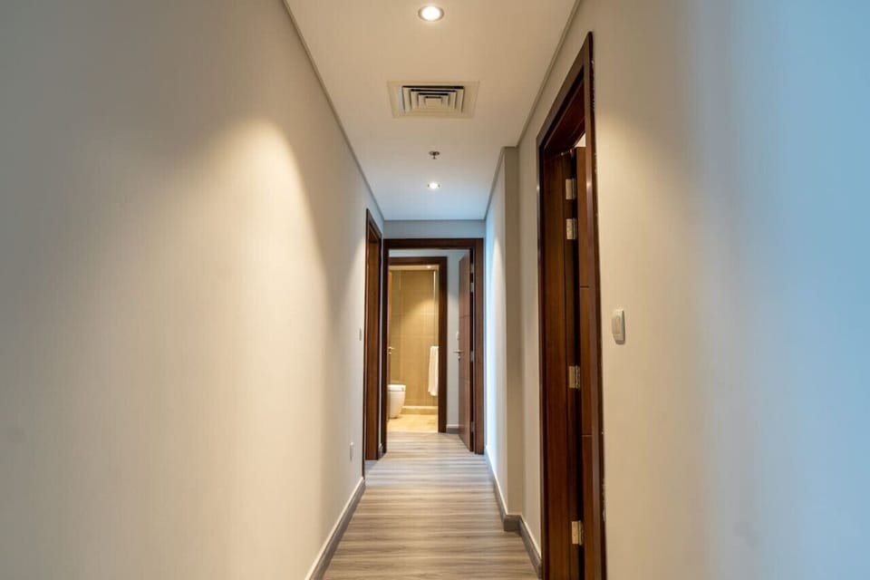 Hallway: Bright and airy, your gateway to a refreshing stay in luxe Dubai!